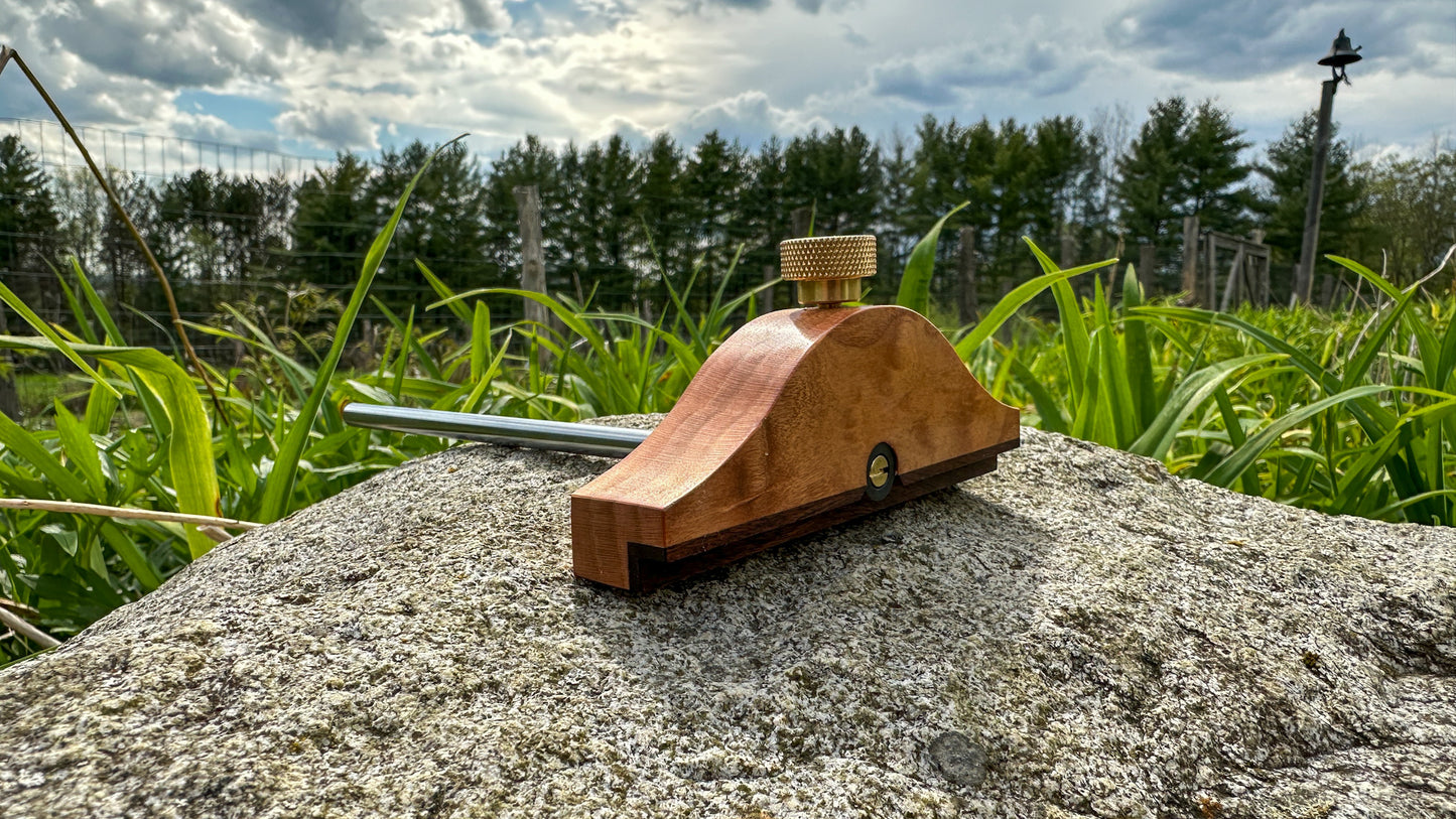 The Honey Brook "No. 85 1/2" Marking Gauge is inspired by the design of the vintage Stanley No. 85 1/2 Panel Gauge. Shown here in Curly Cherry.