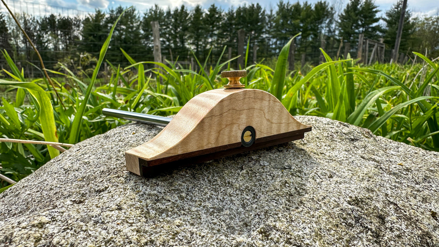The Honey Brook "No. 85 1/2" Marking Gauge is inspired by the design of the vintage Stanley No. 85 1/2 Panel Gauge. Shown here in Tiger Maple