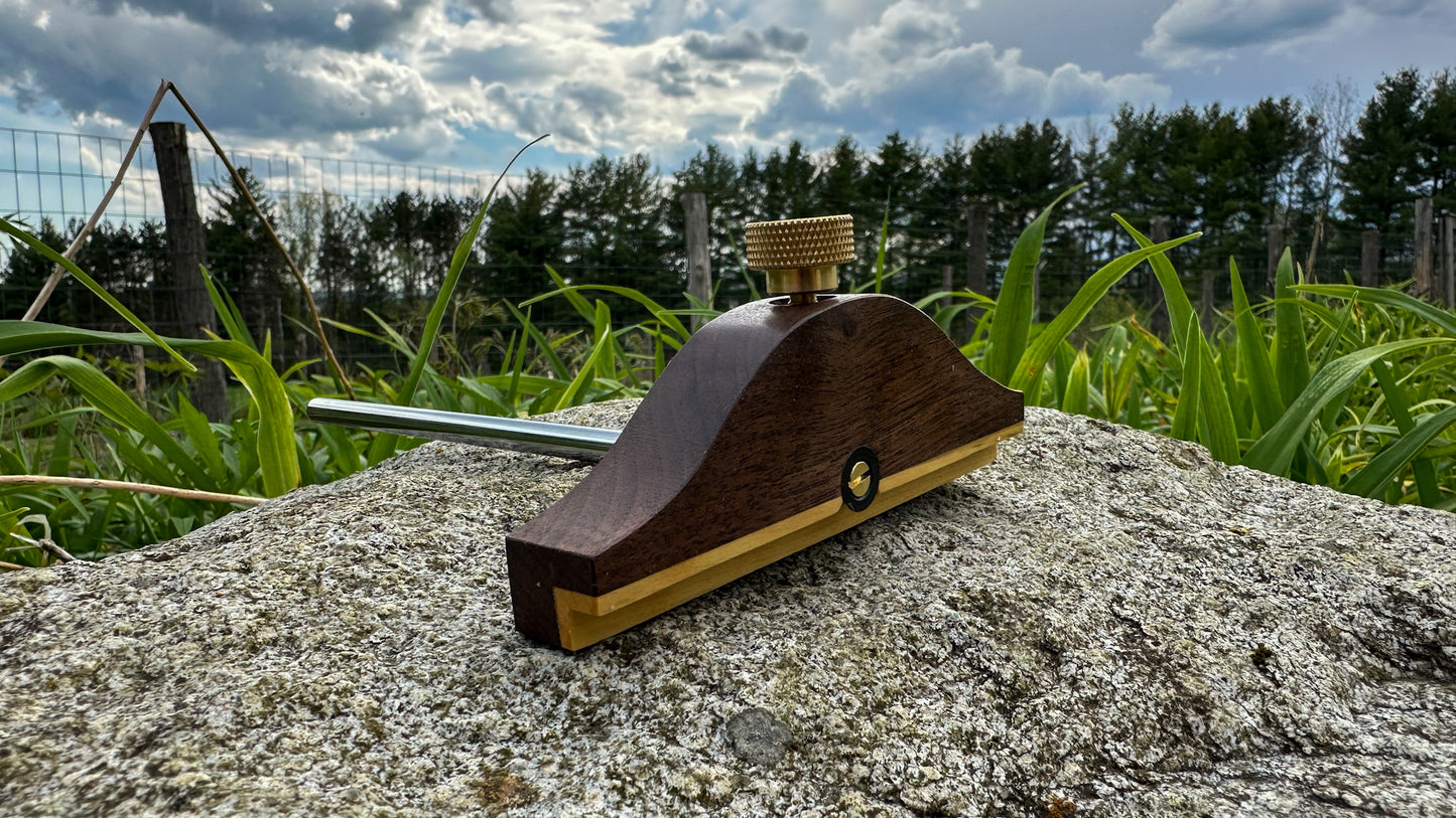 The Honey Brook "No. 85 1/2" Marking Gauge is inspired by the design of the vintage Stanley No. 85 1/2 Panel Gauge. Shown here in walnit with English boxwood inlayed in the fence.